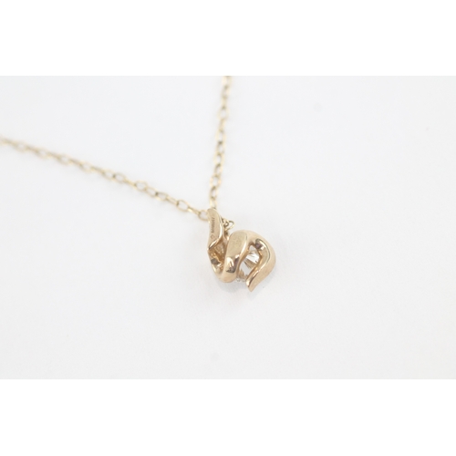 17 - 9ct gold diamond appox 0.22 ct (3.8mm) single stone twist pendant on chain (1g)