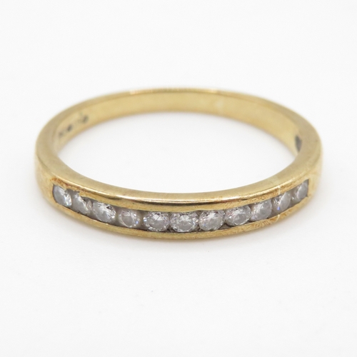 111 - 9ct gold diamond channel ring (1.7g) Size O