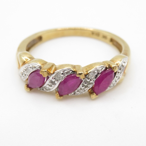 112 - 9ct gold diamond and ruby row ring (2.4g) Size O