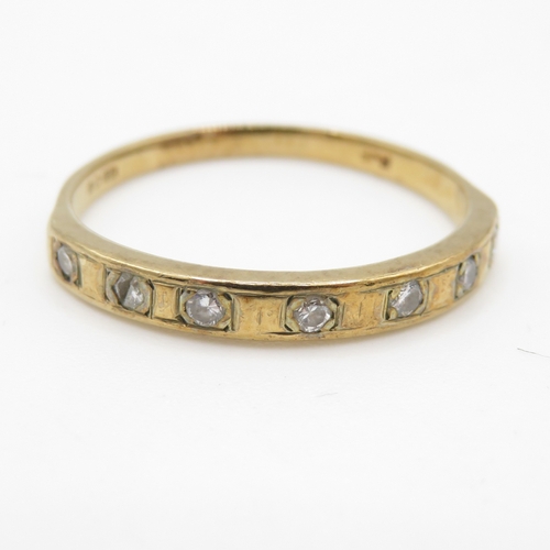 119 - 9ct gold diamond row ring (1.6g) Size O