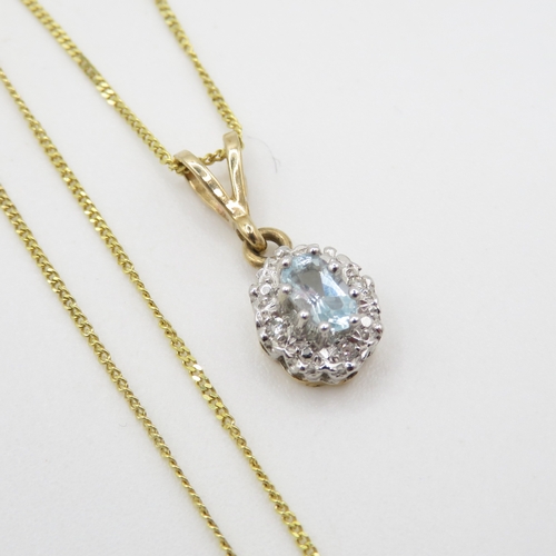 73 - 9ct gold aquamarine & diamond cluster pendant necklace (1.7g)
