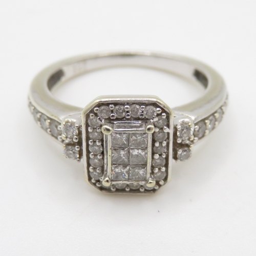 77 - 9ct white gold diamond cluster ring (3.3g) Size M