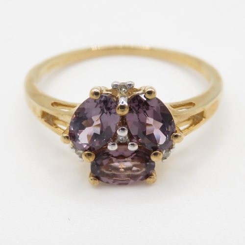 82 - 9ct gold diamond and amethyst dress ring (2.4g) Size Q