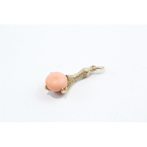 103 - 9ct gold coral claw charm (1.8g)