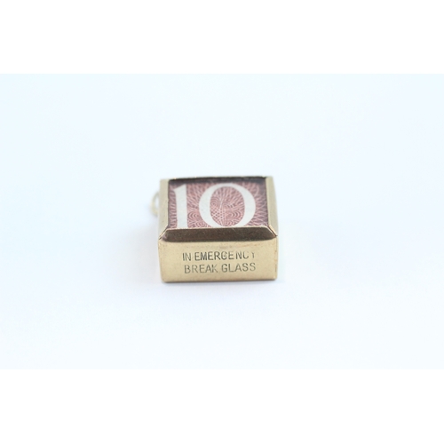 107 - 9ct gold vintage money note charm (2.4g)