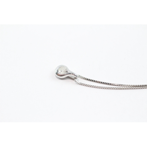 108 - 9ct gold diamond pendant necklace (1.5g)