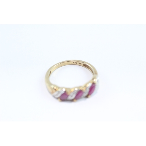 112 - 9ct gold diamond and ruby row ring (2.4g) Size O