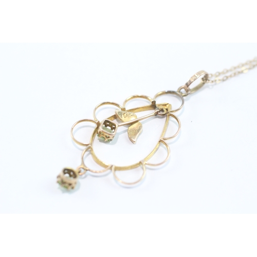 116 - 9ct gold peridot and seed pearl drop pendant on chain (2.6g)