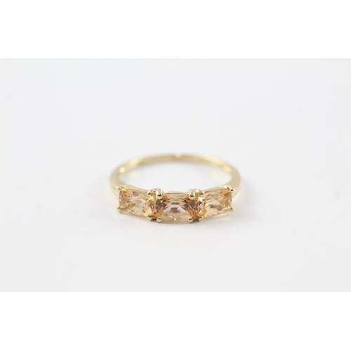 61 - 9ct gold citrine row ring (1.9g) Size P 1/2