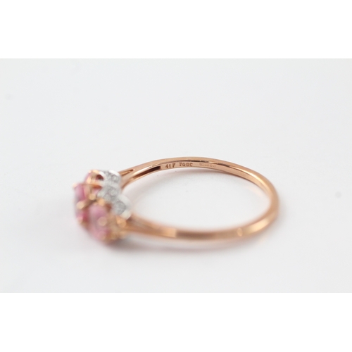 62 - 9ct gold diamond and pink sapphire trilogy ring (2.1g) Size Q