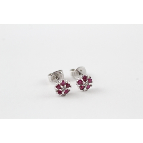 68 - 9ct white gold ruby and diamond stud earrings (1.1g)