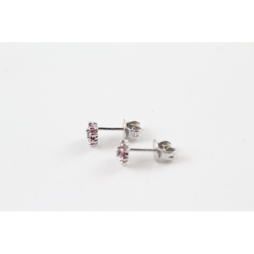 68 - 9ct white gold ruby and diamond stud earrings (1.1g)