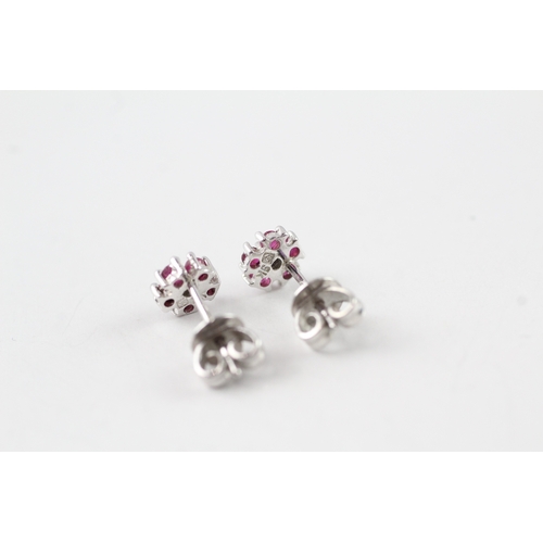 68 - 9ct white gold ruby and diamond stud earrings (1.1g)