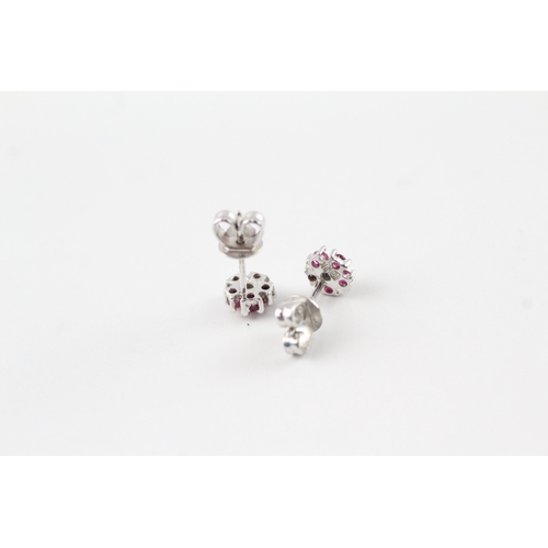 68 - 9ct white gold ruby and diamond stud earrings (1.1g)