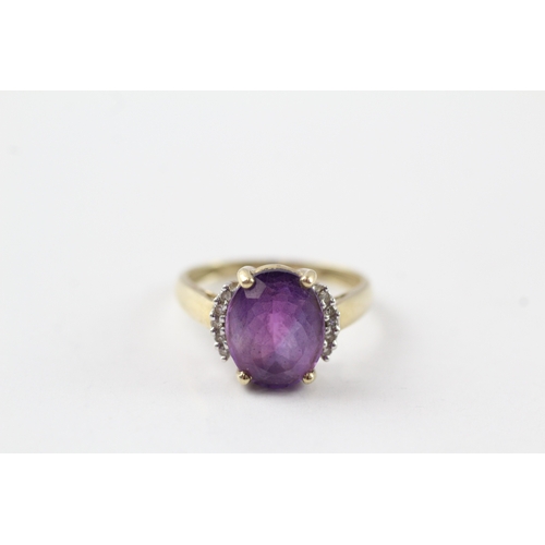 72 - 9ct gold amethyst and diamond framed ring (2.7g) Size N