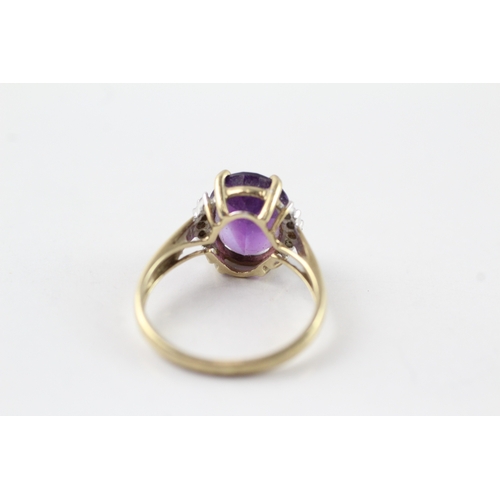 72 - 9ct gold amethyst and diamond framed ring (2.7g) Size N