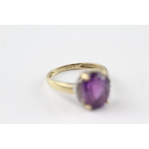 72 - 9ct gold amethyst and diamond framed ring (2.7g) Size N