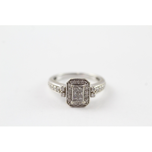 77 - 9ct white gold diamond cluster ring (3.3g) Size M
