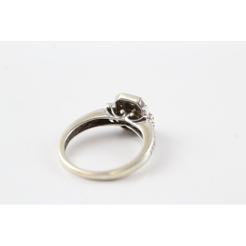 77 - 9ct white gold diamond cluster ring (3.3g) Size M