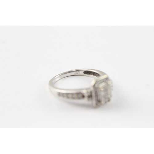 77 - 9ct white gold diamond cluster ring (3.3g) Size M