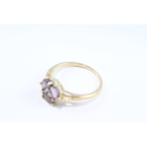 82 - 9ct gold diamond and amethyst dress ring (2.4g) Size Q