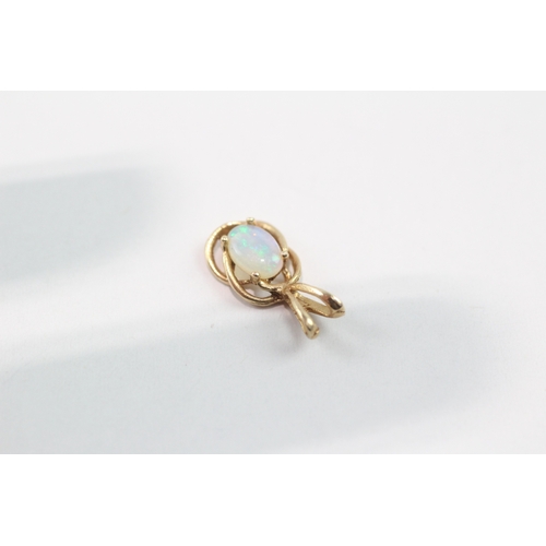 86 - 14ct gold opal pendant (0.5g)