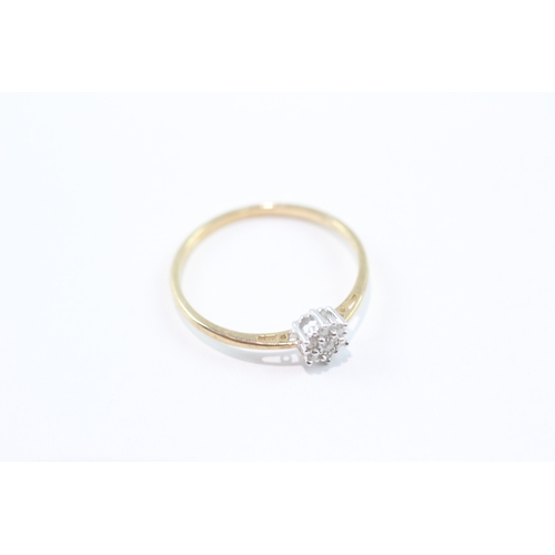 87 - 9ct gold diamond cluster ring (1.1g) Size P