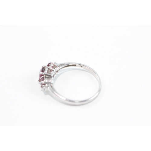 89 - 9ct white gold diamond and amethyst trilogy dress ring (1.8g) Size N