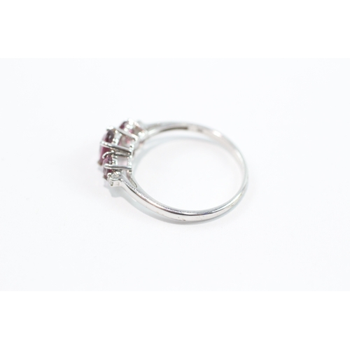 89 - 9ct white gold diamond and amethyst trilogy dress ring (1.8g) Size N