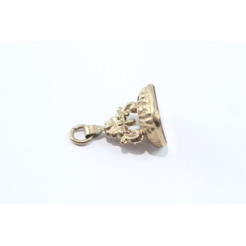 97 - 9ct gold antique carnelian fob (2g)