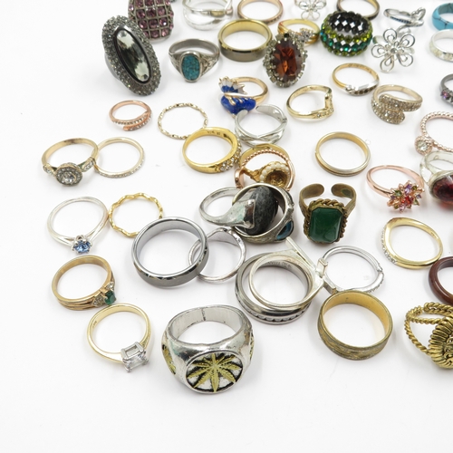 97 - Collection of fashion rings 595g