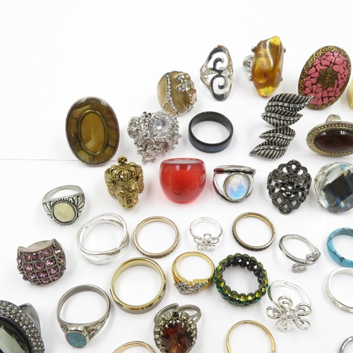 97 - Collection of fashion rings 595g