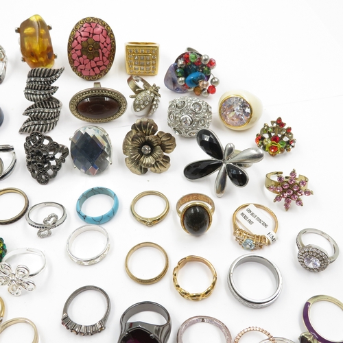 97 - Collection of fashion rings 595g
