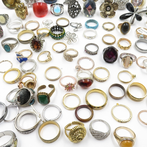 97 - Collection of fashion rings 595g