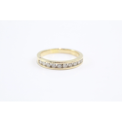10 - 14ct gold diamond channel ring (3.4g) Size Q
