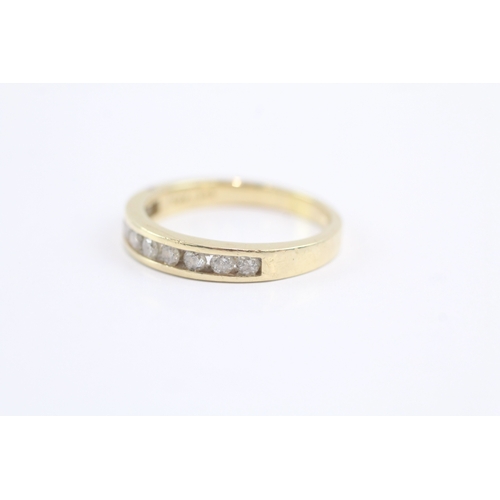 10 - 14ct gold diamond channel ring (3.4g) Size Q