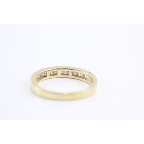 10 - 14ct gold diamond channel ring (3.4g) Size Q