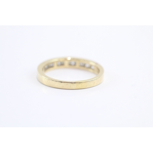 10 - 14ct gold diamond channel ring (3.4g) Size Q