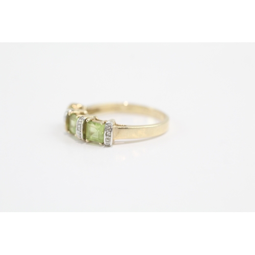 22 - 9ct gold peridot & diamond dress ring (2.9g) Size O 1/2