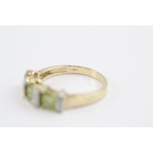 22 - 9ct gold peridot & diamond dress ring (2.9g) Size O 1/2