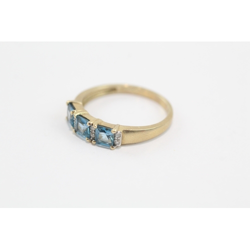 28 - 9ct gold blue topaz diamond ring (2.4g) Size Q
