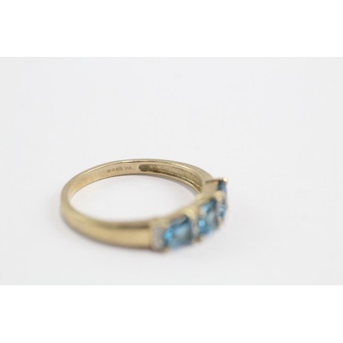 28 - 9ct gold blue topaz diamond ring (2.4g) Size Q