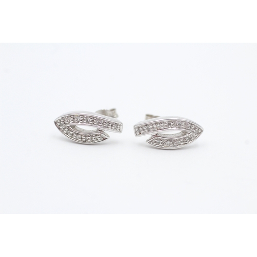 29 - 9ct white gold diamond stud earrings (2g)