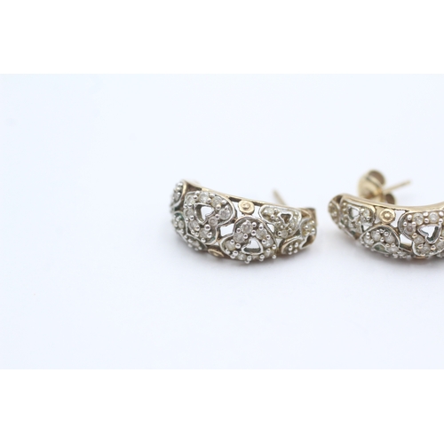 38 - 9ct gold diamond c-hoop earrings (3.4g)