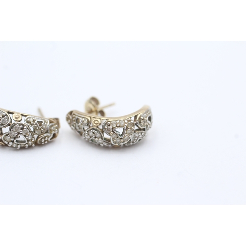 38 - 9ct gold diamond c-hoop earrings (3.4g)