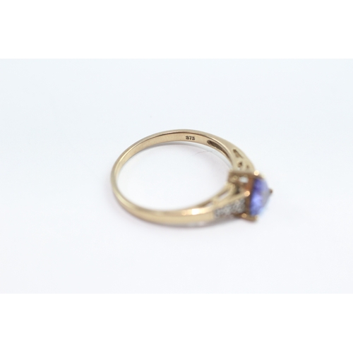 42 - 9ct gold tanzanite and white gemstone ring (1.8g) Size N