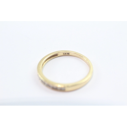 49 - 18ct gold princess cut diamond channel set half eternity ring (2.4g) Size N 1/2