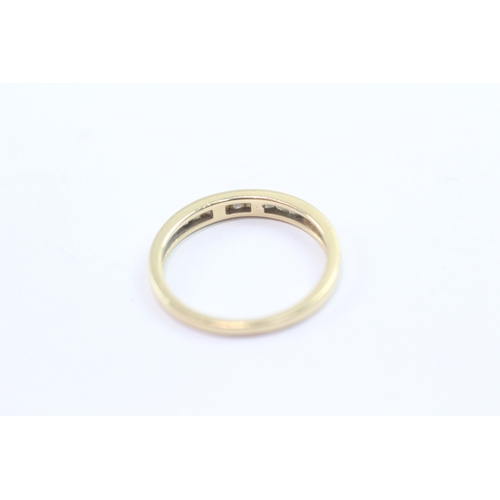 49 - 18ct gold princess cut diamond channel set half eternity ring (2.4g) Size N 1/2