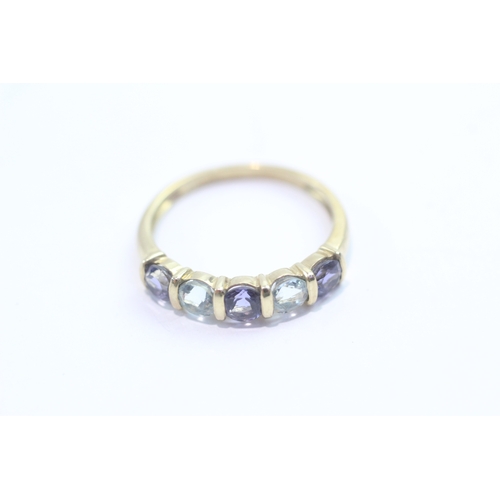 60 - 9ct gold tanzanite aquamarine five-stone ring (2g) Size Q 1/2