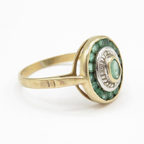 33 - 9ct gold emerald and diamond halo ring (2.7g) Size N